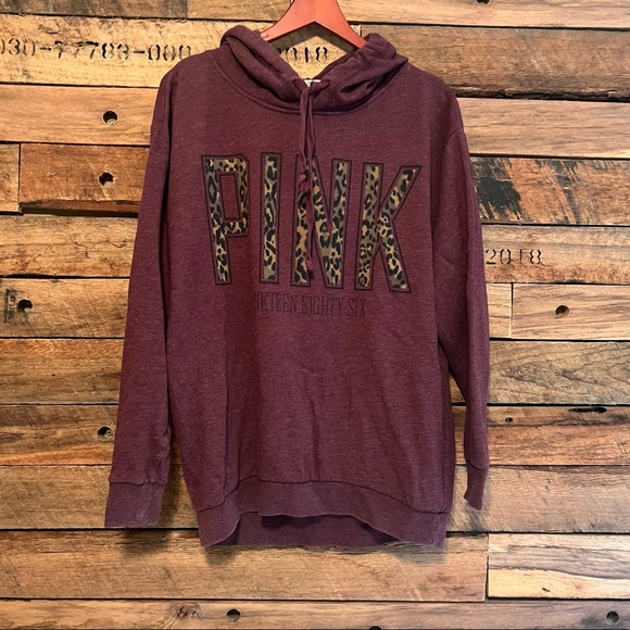Cheetah VS pink hoodie - Picture 1 of 3